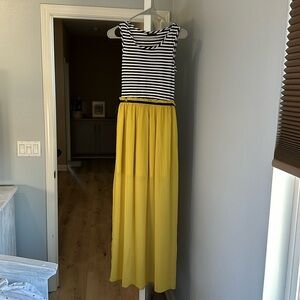 Long dress black and white striped upper and yellow chiffon bottom, size small.